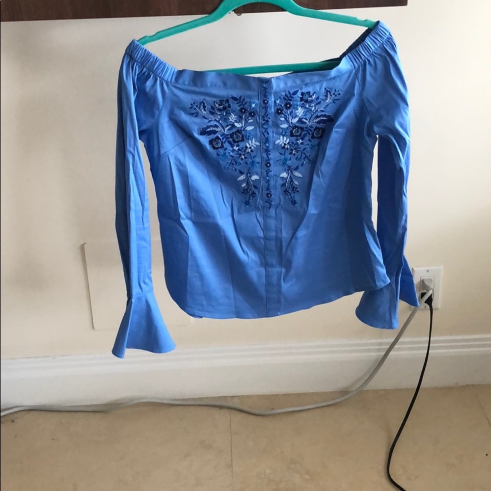 blue top with embroidery